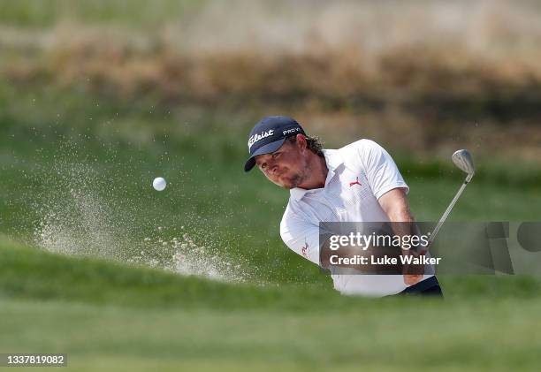 Eddie Pepperell of England plays a bunker shot on the ninth hole during Day One of The Italian Open at Marco Simone Golf Club on September 02, 2021...