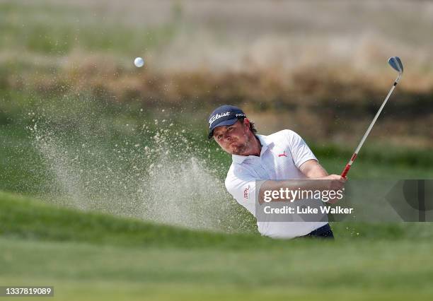 Eddie Pepperell of England plays a bunker shot on the ninth hole during Day One of The Italian Open at Marco Simone Golf Club on September 02, 2021...