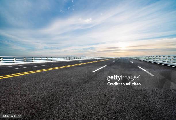 sea crossing bridge - main road stock pictures, royalty-free photos & images