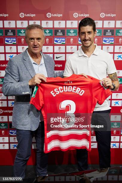 Player Sergio Escudero and Granada CF Sports Director Pep Boada pose for the media during Sergio Escudero presentation as a new player of Granada CF...