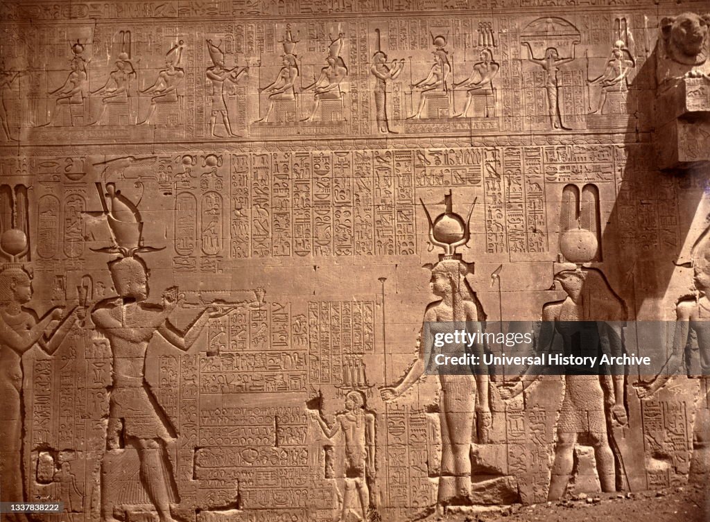 Relief with hieroglyphics covers a wall in the Temple of Hathor