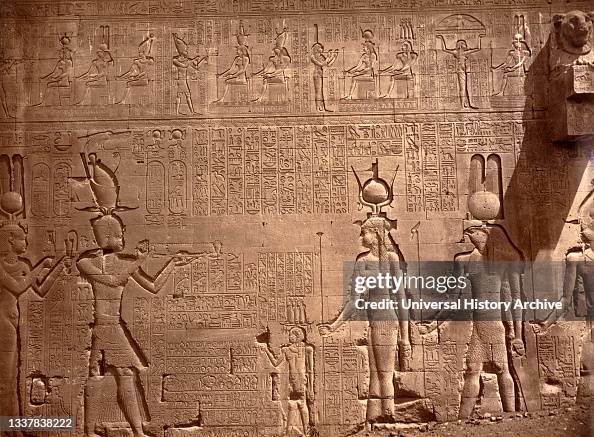 Relief with hieroglyphics covers a wall in the Temple of Hathor Relief with hieroglyphics covers a wall in the Temple of Hathor