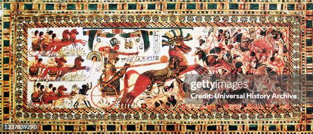 Inlaid panel from a chest in the Tomb of Tutankhamen, depicting the King crushing his enemies in battle. 18th Dynasty, c. 1332-1323 BC.