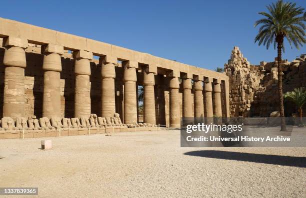 Karnak Temple Complex, in Luxor, Egypt. Construction at the complex began during the reign of Senusret I in the Middle Kingdom and continued into the...