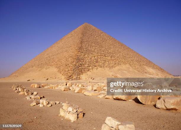 The Red Pyramid, , is the largest of the three major pyramids located at the Dahshur necropolis in Cairo, Egypt. Named for the rusty reddish hue of...