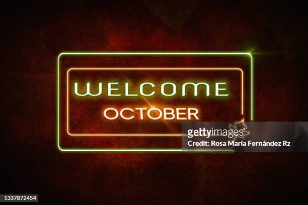 welcome october neon lighting . - outubro imagens e fotografias de stock