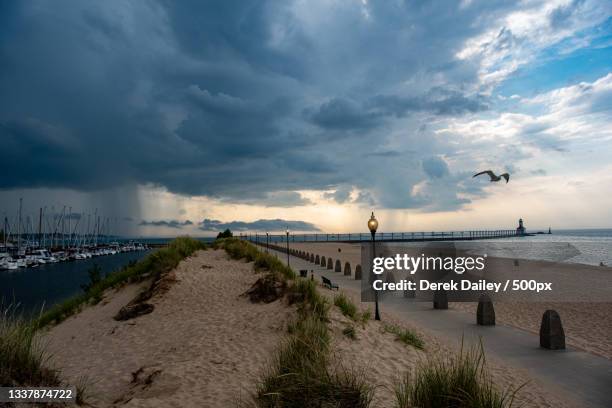 panoramic view of beach against sky,michigan city,united states,usa - michigan city indiana stock pictures, royalty-free photos & images