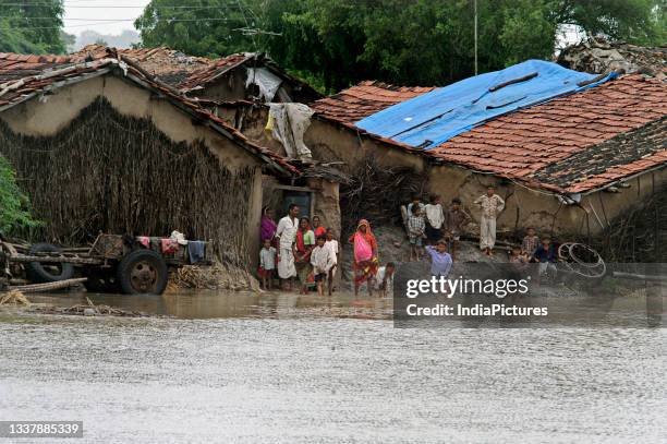 Flood hit villagers.