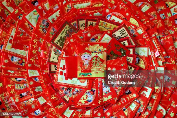 Red envelopes for Chinese and Vietnamese New Year. Red color is a symbol of good luck. Saint Pierre en Faucigny. France.