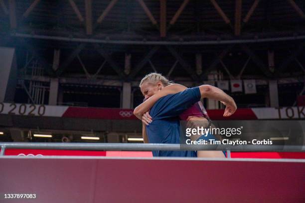 August 5: Katie Nageotte of the United States celebrates her gold medal performance with coach Brad Walker after the pole vault for women final...