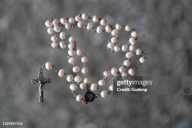 White prayer beads with crucifix. France.