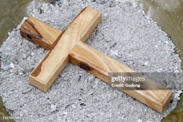 Cross with ashes. Ash Wednesday. Lent season. France.