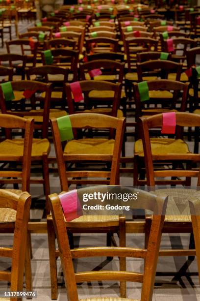 Social distancing marks on chairs in Saint Jacques-Saint Christophe de la Villette church, Paris, France.