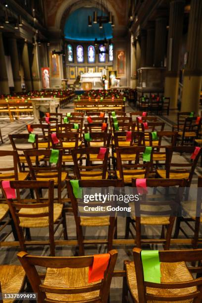 Social distancing marks on chairs in Saint Jacques-Saint Christophe de la Villette church, Paris, France.