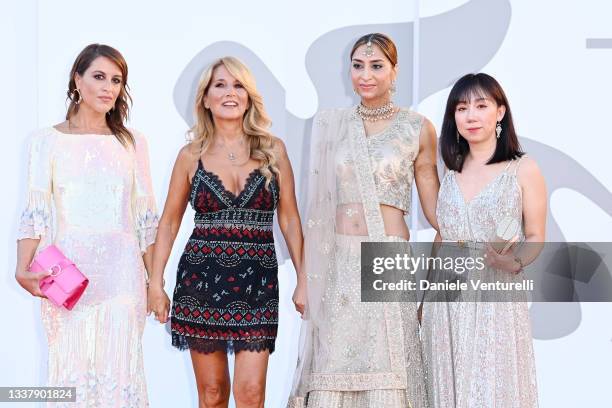 Francesca Carollo, Jo Squillo, Parvinder Kaur Aoulakh aka Pinky and a guest attend the red carpet of the movie "The Hand Of God" during the 78th...