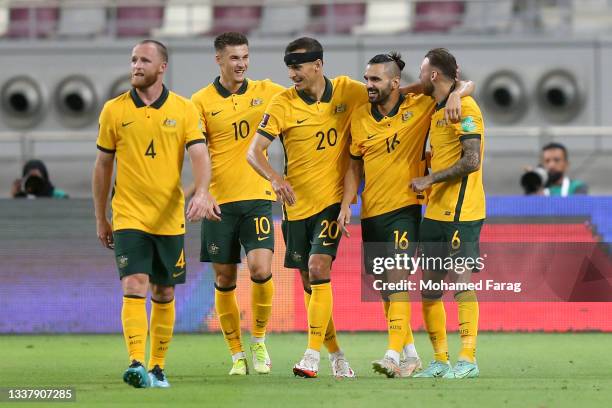 Martin Boyle of Australia celebrates with Aziz Behich, Trent Sainsbury, Ajdin Hrustic and Rhyan Grant after scoring their team's second goal during...