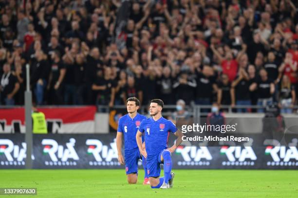 Declan Rice of England takes a knee in support of the Black Lives Matter anti-racism movement during the 2022 FIFA World Cup Qualifier match between...