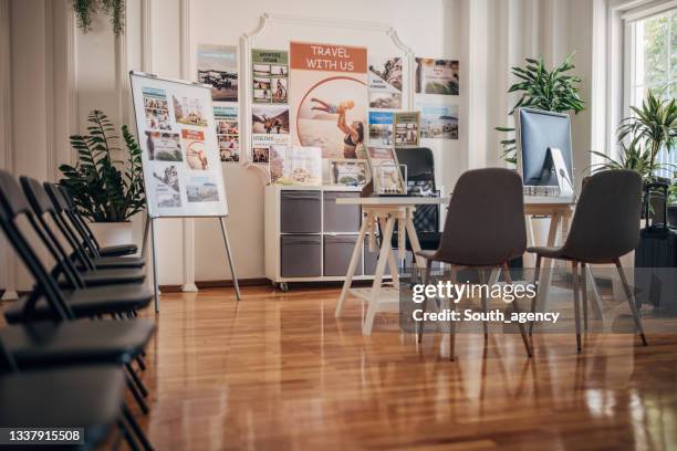 inside of a modern travel agency - travel agency stock pictures, royalty-free photos & images