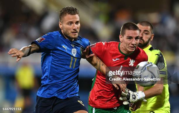 Ciro Immobile of Italy competes for the ball with Valentin Antov of Bulgaria during the 2022 FIFA World Cup Qualifier match between Italy and...