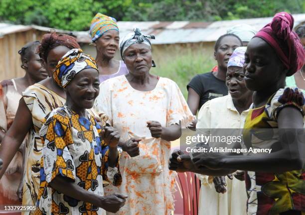 Gabonese women celebrating in a village in Iboundji , May 07, 2014. Des femmes gabonaises en fete dans un village d'Iboundji , le 07 Mai 2014..