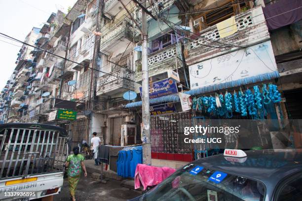 Daily life in Bo Soon Pat street, Sule Pagoda area, city center, Yangon, Myanmar, Asia.