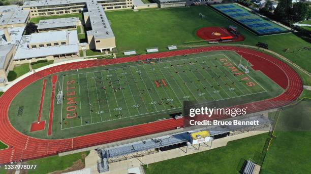 Student athletes at Hicksville High School attend football and soccer practice on September 2, 2021 in Hicksville, New York.