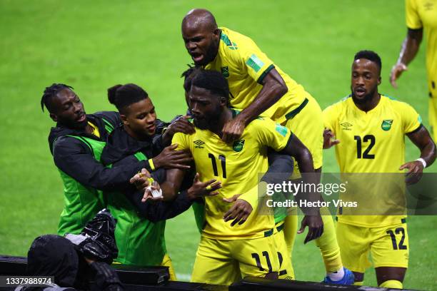 Shamar Nicholson of Jamaica celebrates with teammates after scoring his team's first goal during the match between Mexico and Jamaica as part of the...