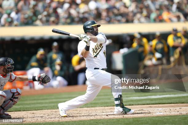 Mitch Moreland of the Oakland Athletics bats during the game against the San Francisco Giants at RingCentral Coliseum on August 21, 2021 in Oakland,...