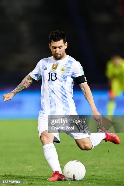 Lionel Messi of Argentina kicks the ball during a match between Venezuela and Argentina as part of South American Qualifiers for Qatar 2022 at...