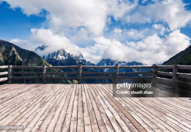 observation point by the snowcapped mountain - wooden railing stock pictures, royalty-free photos & images