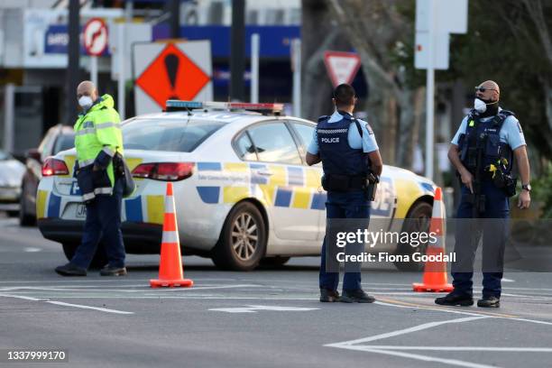 Police guard the area around Countdown LynnMall where a violent extremist reportedly stabbed six people before being shot by police on September 03,...