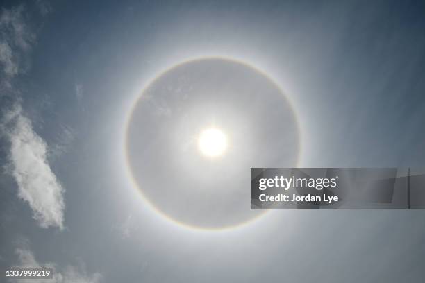 solar halo - halo stock pictures, royalty-free photos & images