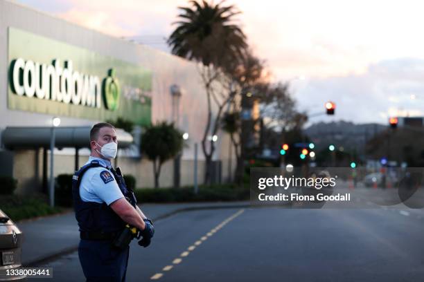 Police guard the area around Countdown LynnMall after a violent extremist took out a terrorist attack stabbing six people before being shot by police...