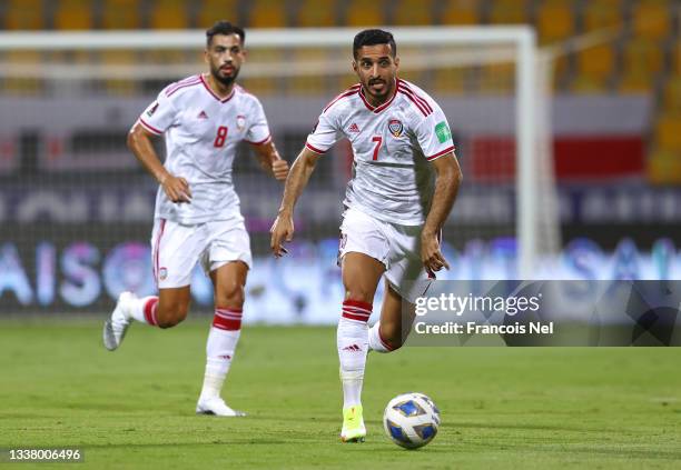 Ali Mabkhout of United Arab Emirates runs with the ball during the 2022 FIFA World Cup Qualifier match between UAE and Lebanon at Zabeel Stadium on...
