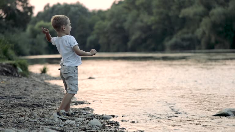 Boy Throwing Rocks Kid Throwing Rock Videos and HD Footage - Getty Images
