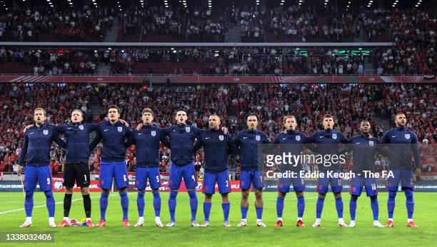 Players of England sing the national anthem prior to the 2022 FIFA World Cup Qualifier match between Hungary and England at Stadium Puskas Ferenc on...