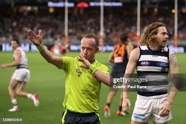 Umpire Ray Chamberlain awards a free kick during the AFL First Elimination Final match between Geelong Cats and Greater Western Sydney Giants at...