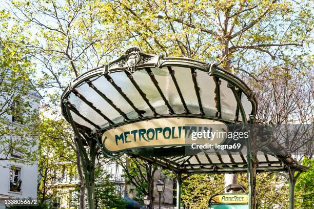 metro entrance in paris, in art nouveau style - paris metro stock pictures, royalty-free photos & images