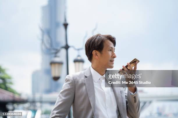 business man success corporate, smart business man asia using smart phone - call me stock pictures, royalty-free photos & images