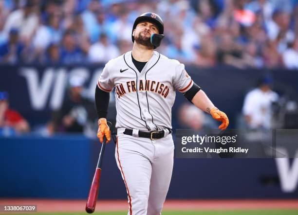 Davis of the San Francisco Giants reacts after a called third strike and is eventually ejected from the game in the third inning against the Toronto...