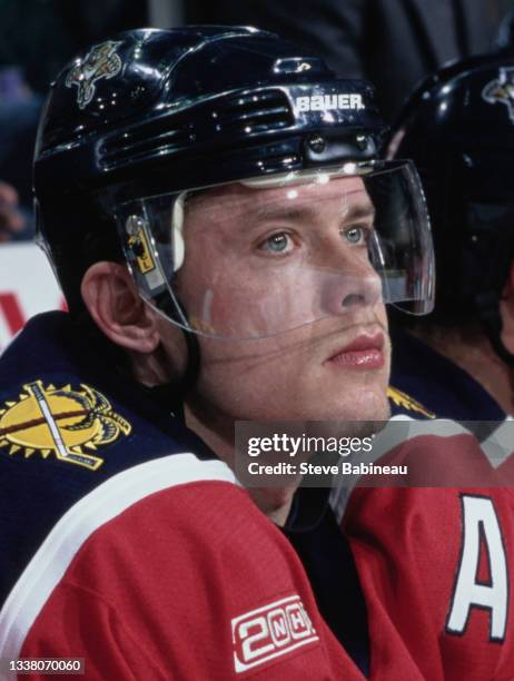 Pavel Bure of Russia and Right Wing for the Florida Panthers looks on from the bench during the NHL Eastern Conference Northeast Division game...