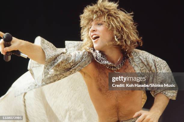 Jon Bon Jovi of US rock band Bon Jovi performs at summer rock festival 'Super Rock 84' on their first visit to Japan, Naogoya Baseball Stadium,...