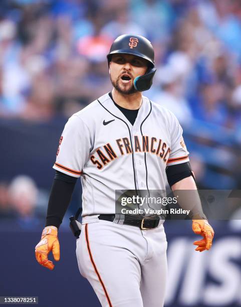 Davis of the San Francisco Giants reacts after a called third strike and is eventually ejected from the game in the third inning against the Toronto...