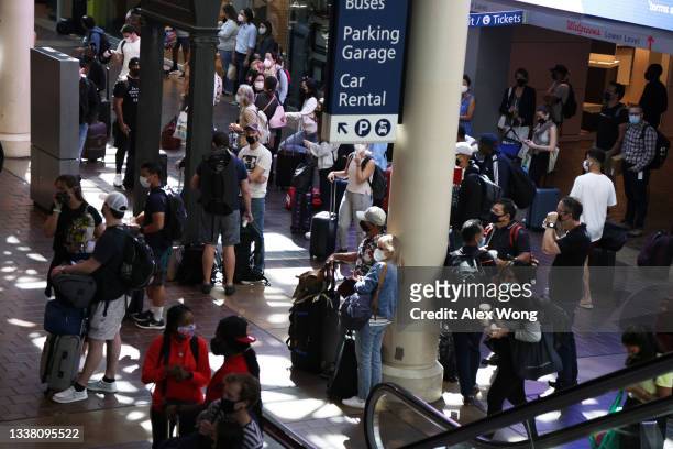 Passengers wait at the concourse of Union Station September 3, 2021 in Washington, DC. The director of the Centers for Disease Control and Prevention...