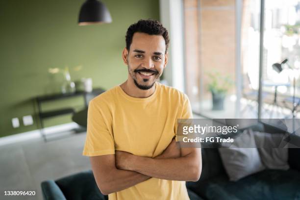 portrait of a man at home - man goatee stock pictures, royalty-free photos & images