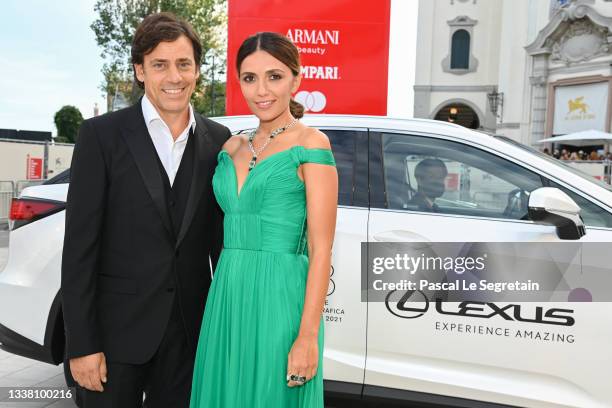 Davide Devenuto and Hostess of the festival, Serena Rossi arrive on the red carpet ahead of the "Dune" screening during the 78th Venice Film Festival...