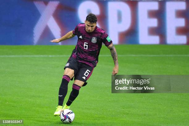 Jorge Sanchez of Mexico drives the ball during the match between Mexico and Jamaica as part of the Concacaf 2022 FIFA World Cup Qualifier at Azteca...