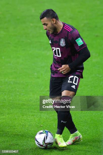 Alexis Vega of Mexico drives the ball during the match between Mexico and Jamaica as part of the Concacaf 2022 FIFA World Cup Qualifier at Azteca...