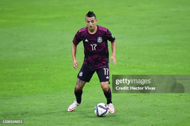 Roberto Alvarado of Mexico drives the ball during the match between Mexico and Jamaica as part of the Concacaf 2022 FIFA World Cup Qualifier at...