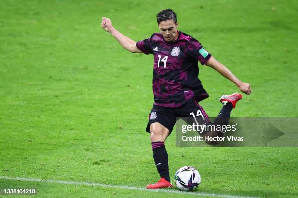 Sebastian Cordova of Mexico kicks the ball during the match between Mexico and Jamaica as part of the Concacaf 2022 FIFA World Cup Qualifier at...